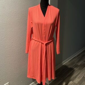 Beautiful color coral  bathroom. retreat by Rhonda shear size large. Get cozy